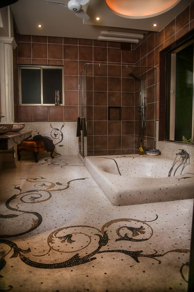 Inspiration for a traditional bathroom in Chicago with black tiles, brown tiles and white tiles.