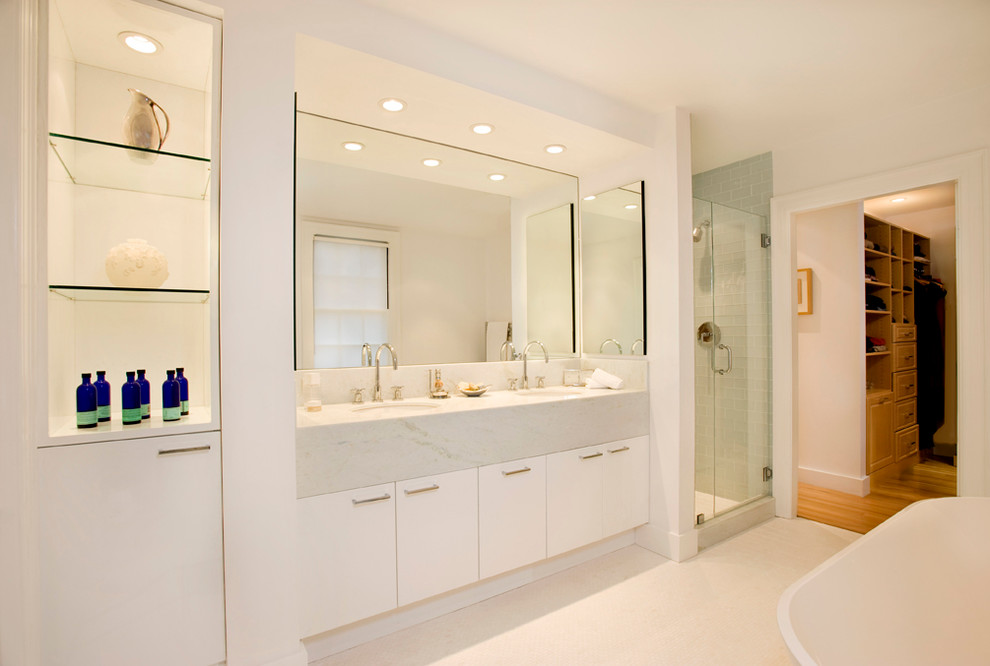 Inspiration for a mid-sized zen bathroom remodel in Boston with flat-panel cabinets and medium tone wood cabinets