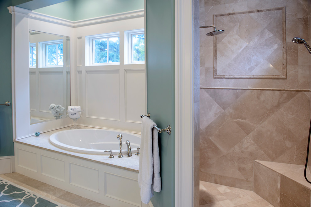 Classic bathroom in Atlanta with a built-in bath, beige tiles, beige walls, marble flooring and marble worktops.