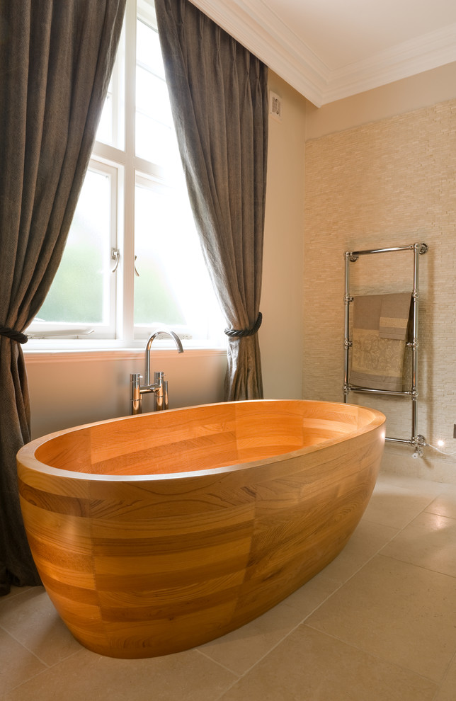 This is an example of a contemporary bathroom in London with a freestanding bath.