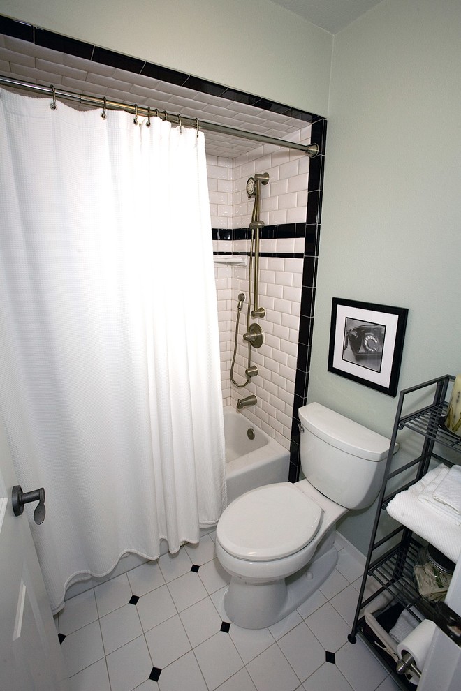This is an example of a medium sized classic shower room bathroom in Other with a vessel sink, freestanding cabinets, dark wood cabinets, wooden worktops, an alcove bath, a shower/bath combination, a two-piece toilet, white tiles, ceramic tiles, green walls and ceramic flooring.