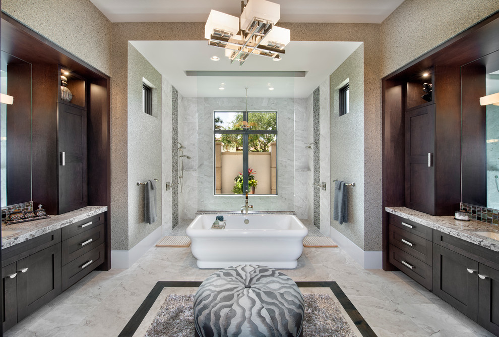 Design ideas for a large contemporary ensuite bathroom in Miami with shaker cabinets, dark wood cabinets, a freestanding bath, multi-coloured walls, a submerged sink, granite worktops, a double shower and an open shower.