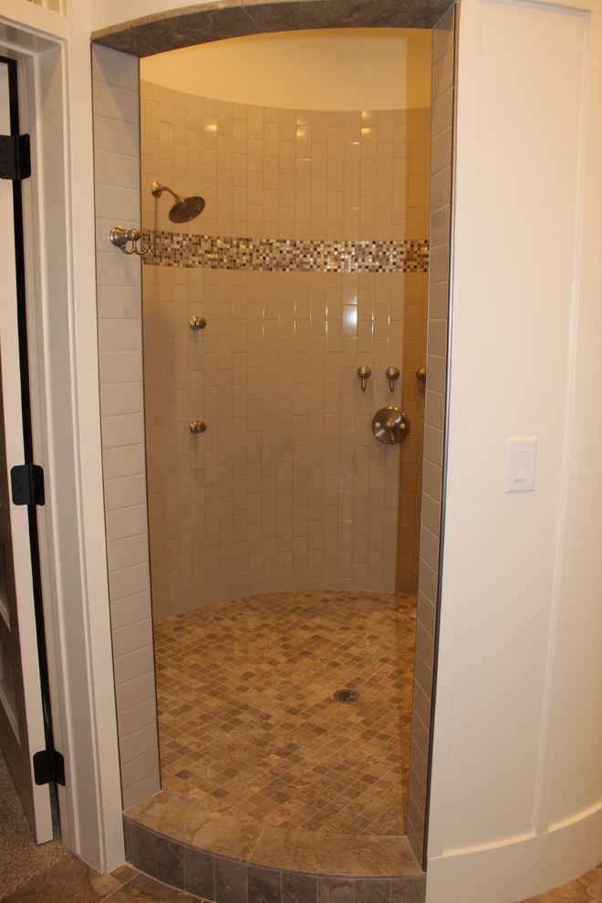 Large classic ensuite bathroom in Salt Lake City with shaker cabinets, grey cabinets, a walk-in shower, a bidet, grey tiles, metro tiles, grey walls and a submerged sink.