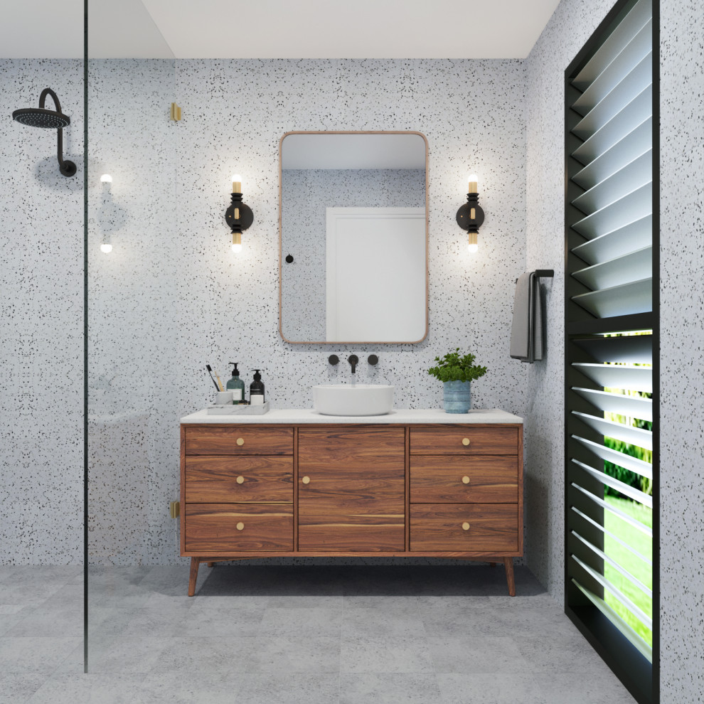 Medium sized traditional ensuite bathroom with freestanding cabinets, medium wood cabinets, a walk-in shower, grey tiles, ceramic tiles, grey walls, cement flooring, a vessel sink, engineered stone worktops, grey floors and white worktops.