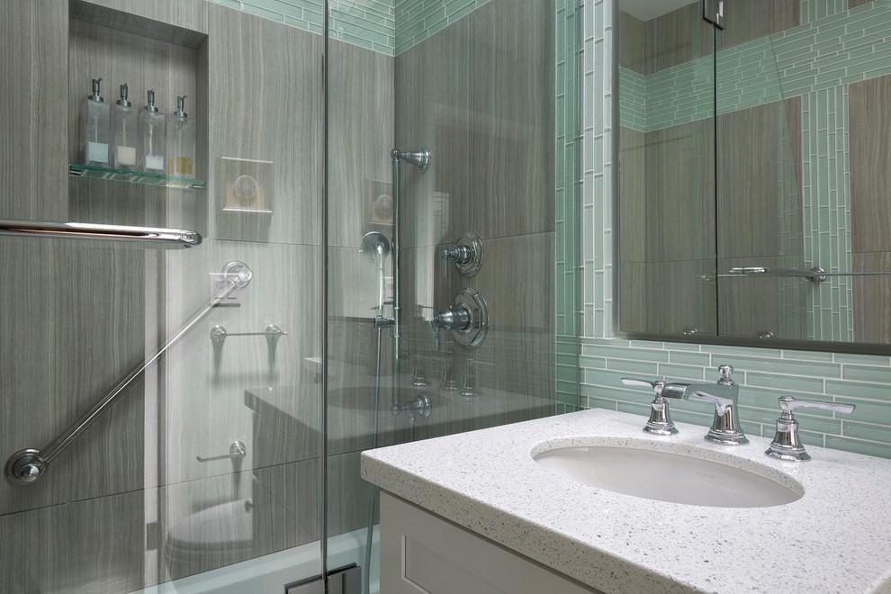 Example of a small trendy 3/4 blue tile and glass tile ceramic tile bathroom design in San Francisco with recessed-panel cabinets, white cabinets, a two-piece toilet, gray walls, an undermount sink and quartz countertops