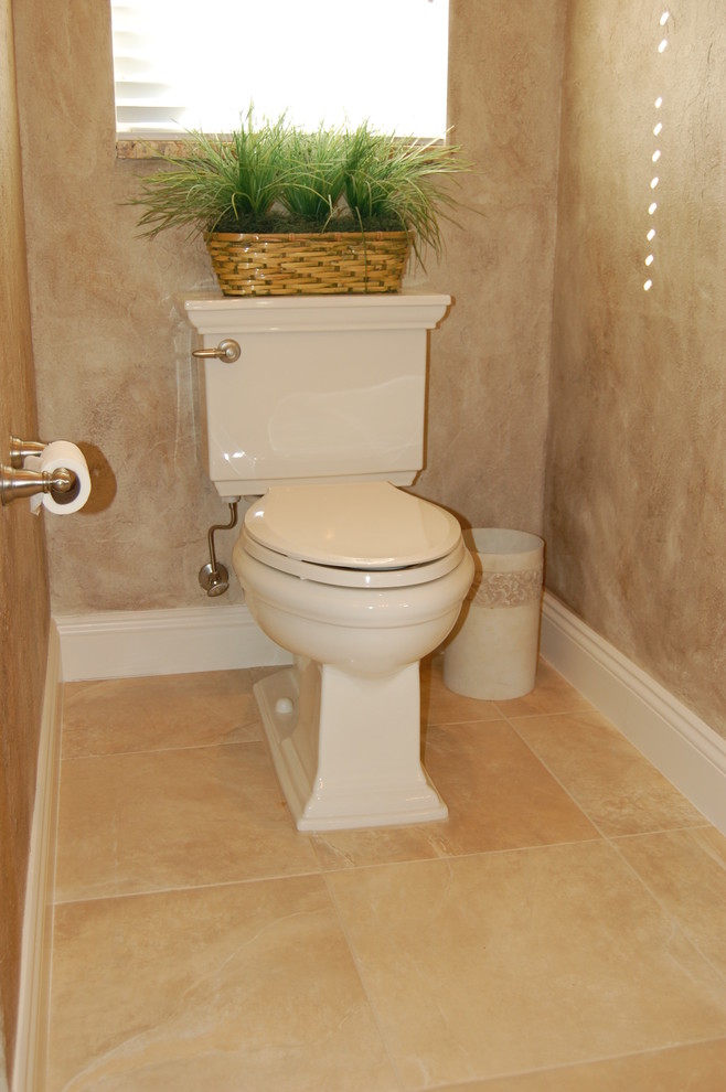 Inspiration for a large timeless master beige tile and porcelain tile porcelain tile bathroom remodel in Tampa with a two-piece toilet and multicolored walls