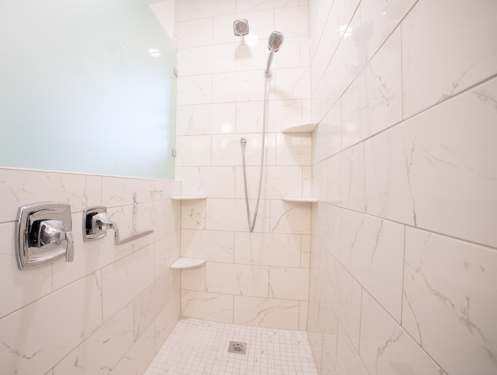 Mid-sized transitional master white tile and porcelain tile porcelain tile and white floor bathroom photo in Tampa with shaker cabinets, white cabinets, a one-piece toilet, white walls, an undermount sink and quartz countertops