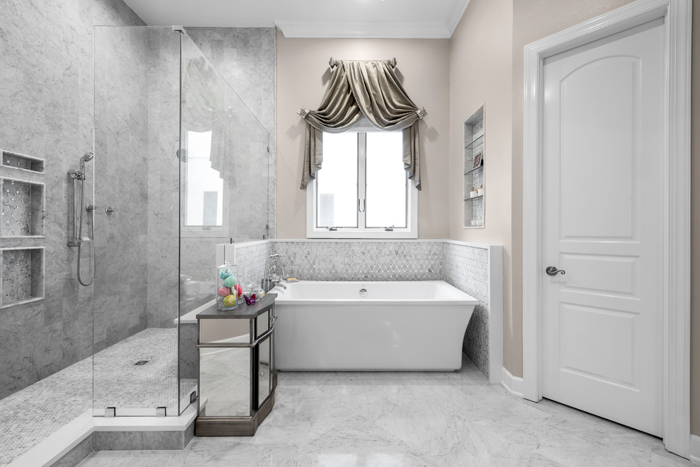 Inspiration for a huge timeless master white tile and marble tile marble floor and white floor bathroom remodel in Tampa with recessed-panel cabinets, white cabinets, beige walls, an undermount sink, quartz countertops and white countertops