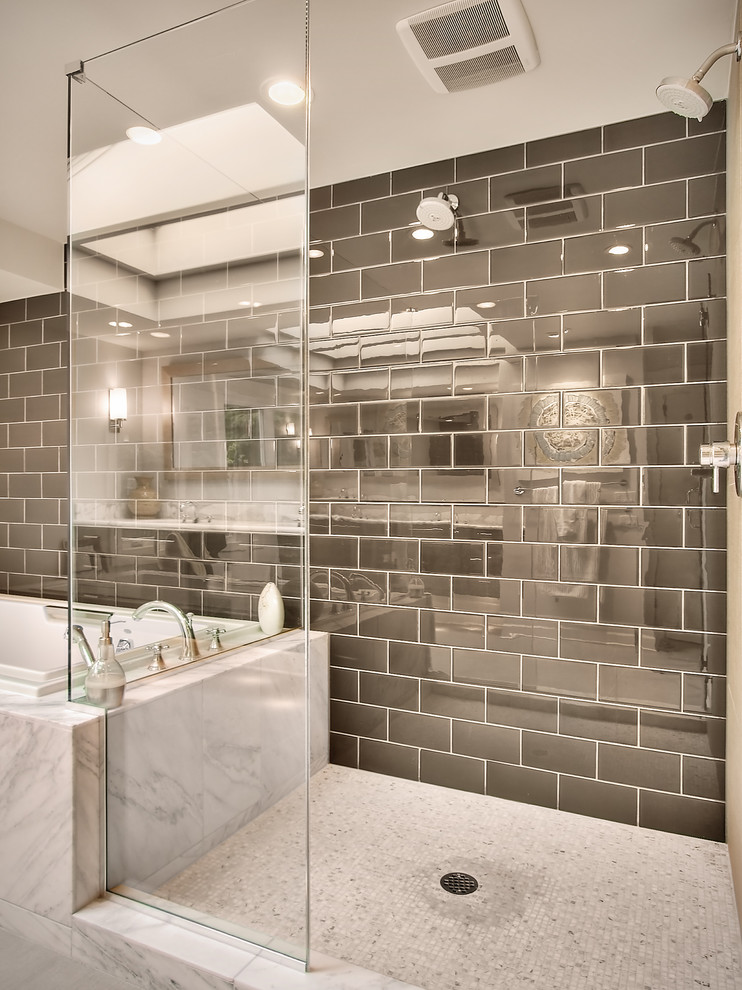 На фото: главная ванная комната среднего размера в современном стиле с керамической плиткой, накладной ванной, двойным душем, серой плиткой и мраморным полом