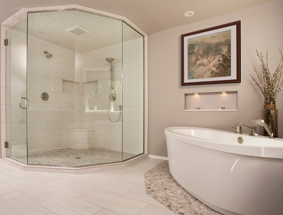 Photo of a large contemporary ensuite bathroom in Seattle with a submerged sink, flat-panel cabinets, dark wood cabinets, engineered stone worktops, a freestanding bath, a double shower, a two-piece toilet, beige tiles, porcelain tiles, brown walls and porcelain flooring.