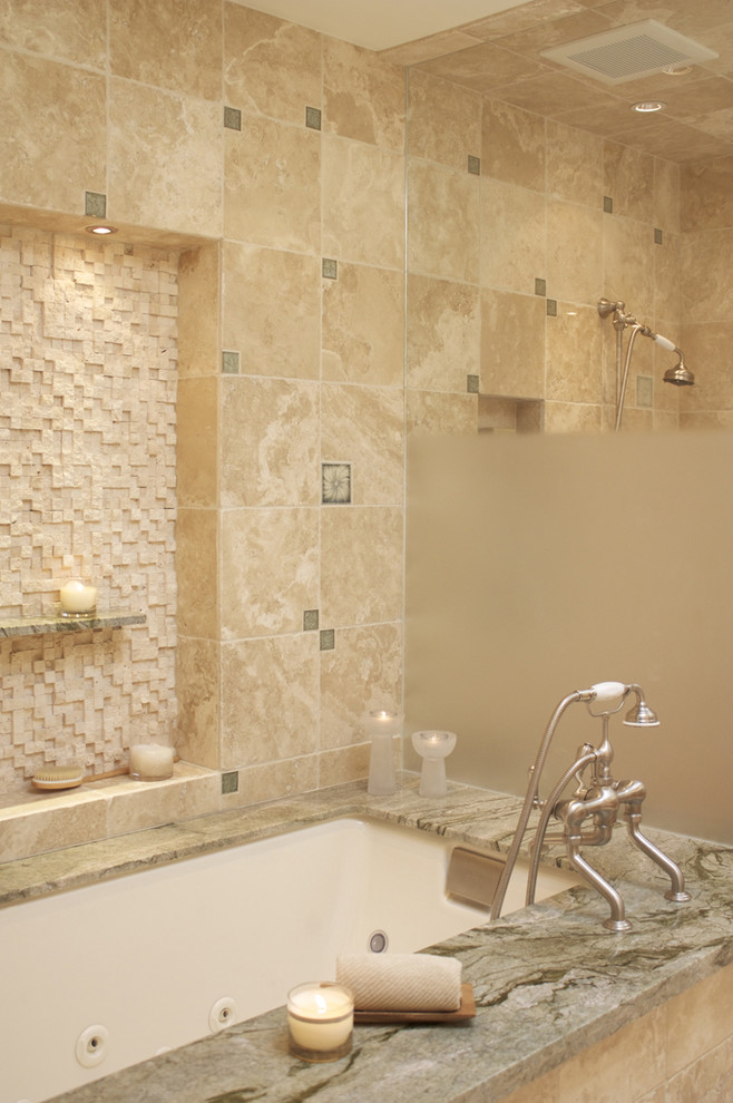 Inspiration for a mid-sized timeless master beige tile and stone tile travertine floor bathroom remodel in Los Angeles with an undermount sink, flat-panel cabinets, medium tone wood cabinets, marble countertops and an undermount tub