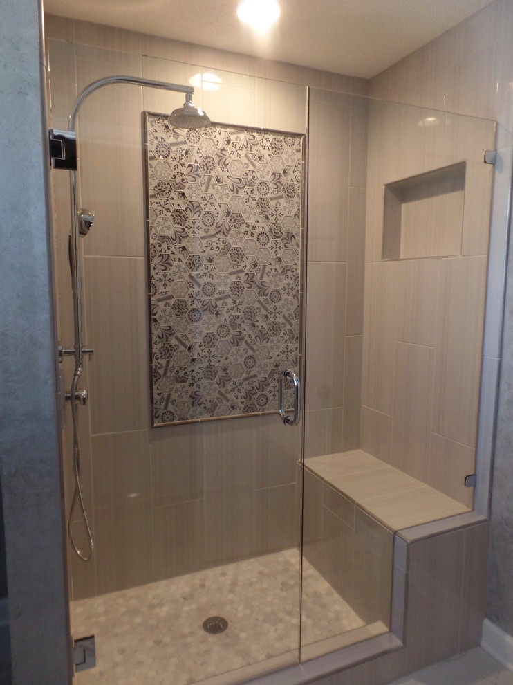 This is an example of a medium sized bohemian ensuite bathroom in Other with an alcove shower, a two-piece toilet, grey tiles, porcelain tiles, grey walls, porcelain flooring, white floors and a hinged door.