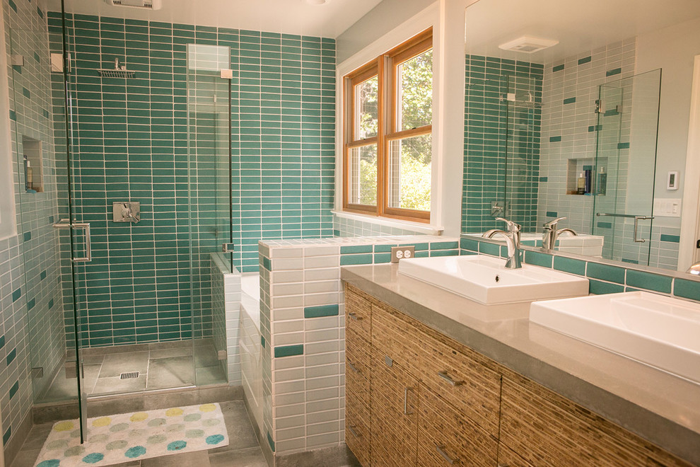 Mid-sized trendy master blue tile and ceramic tile cement tile floor and gray floor bathroom photo in San Francisco with furniture-like cabinets, light wood cabinets, a one-piece toilet, blue walls, a drop-in sink, concrete countertops and a hinged shower door