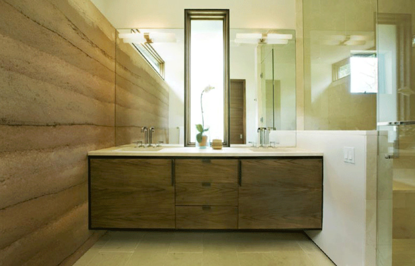 Cette photo montre une salle de bain montagne en bois vieilli avec un placard à porte plane et un lavabo encastré.