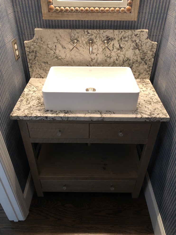 Bathroom - small country 3/4 multicolored tile and stone slab dark wood floor and brown floor bathroom idea in Atlanta with furniture-like cabinets, beige cabinets, blue walls, a vessel sink, granite countertops and multicolored countertops