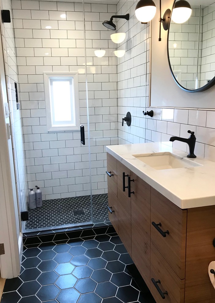 Inspiration for a small 1960s master white tile and ceramic tile ceramic tile and black floor doorless shower remodel in San Francisco with flat-panel cabinets, dark wood cabinets, a wall-mount toilet, beige walls, an undermount sink, quartz countertops and a hinged shower door