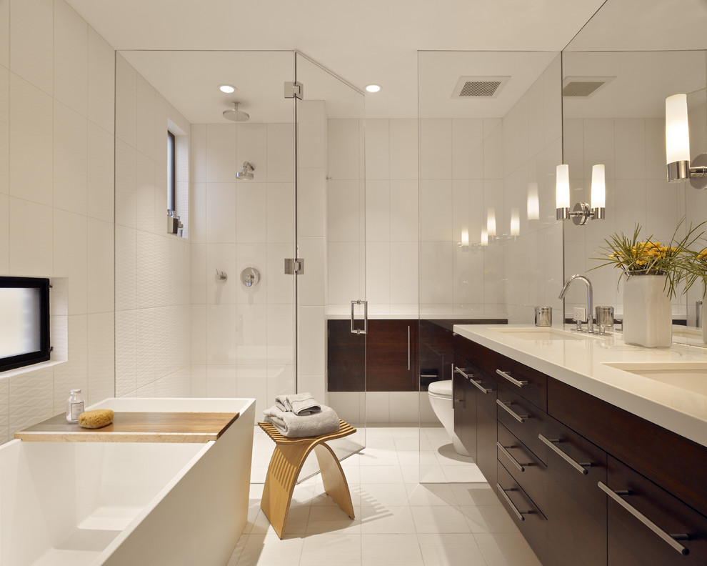 Inspiration for a contemporary bathroom in San Francisco with a submerged sink, dark wood cabinets, a freestanding bath, a built-in shower and white tiles.