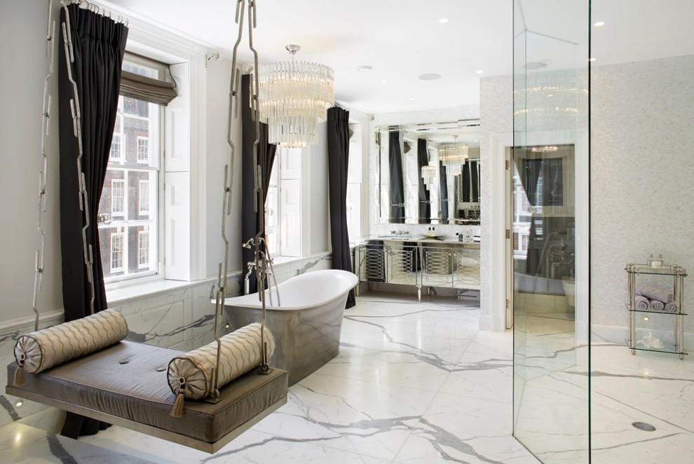 На фото: ванная комната в современном стиле с плиткой из листового камня и мраморной столешницей