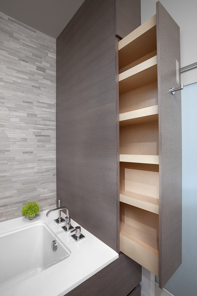 Photo of a large contemporary ensuite bathroom in Vancouver with open cabinets, grey cabinets, a corner shower, beige tiles, porcelain tiles, beige walls, porcelain flooring, a trough sink and engineered stone worktops.