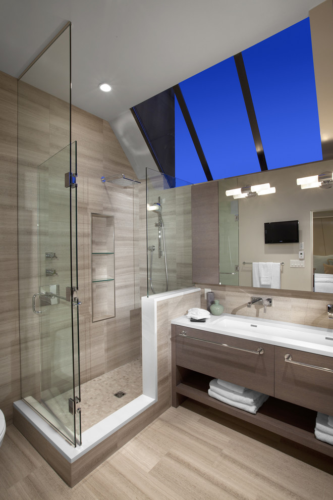 Example of a large trendy master beige tile and porcelain tile porcelain tile corner shower design in Vancouver with a trough sink, open cabinets, gray cabinets, beige walls and quartz countertops
