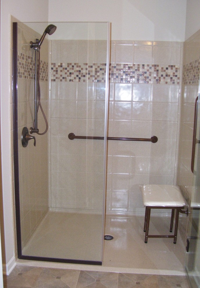 Walk-in shower photo with a hinged shower door