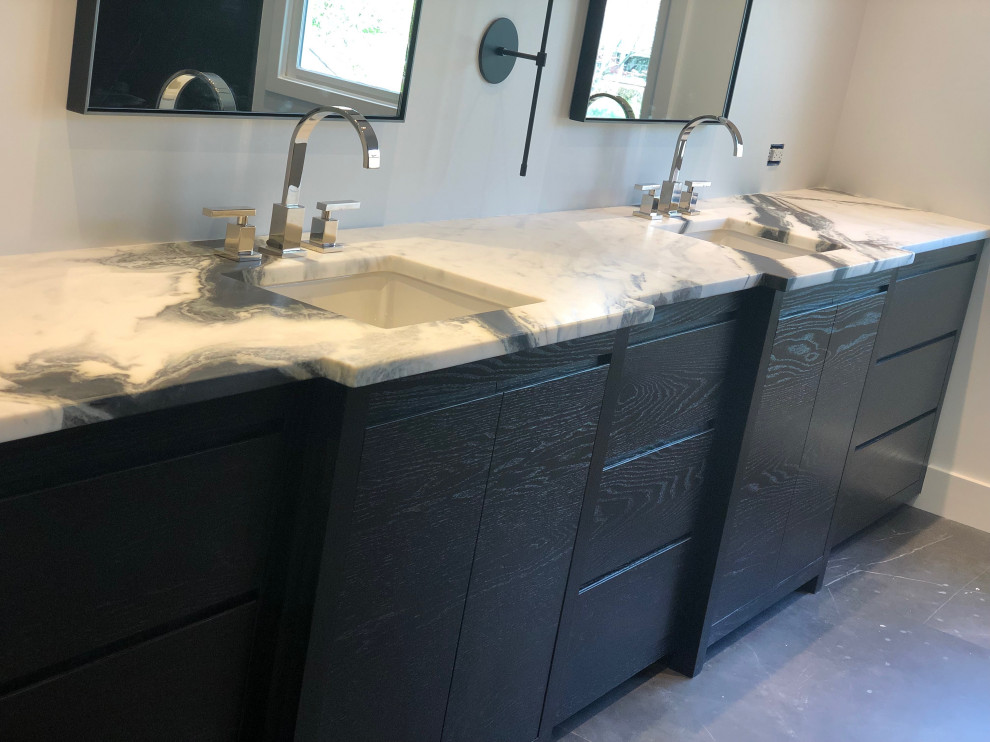 Large eclectic master white tile double-sink bathroom photo in DC Metro with black cabinets, a bidet, an undermount sink, marble countertops, a hinged shower door, white countertops and a built-in vanity