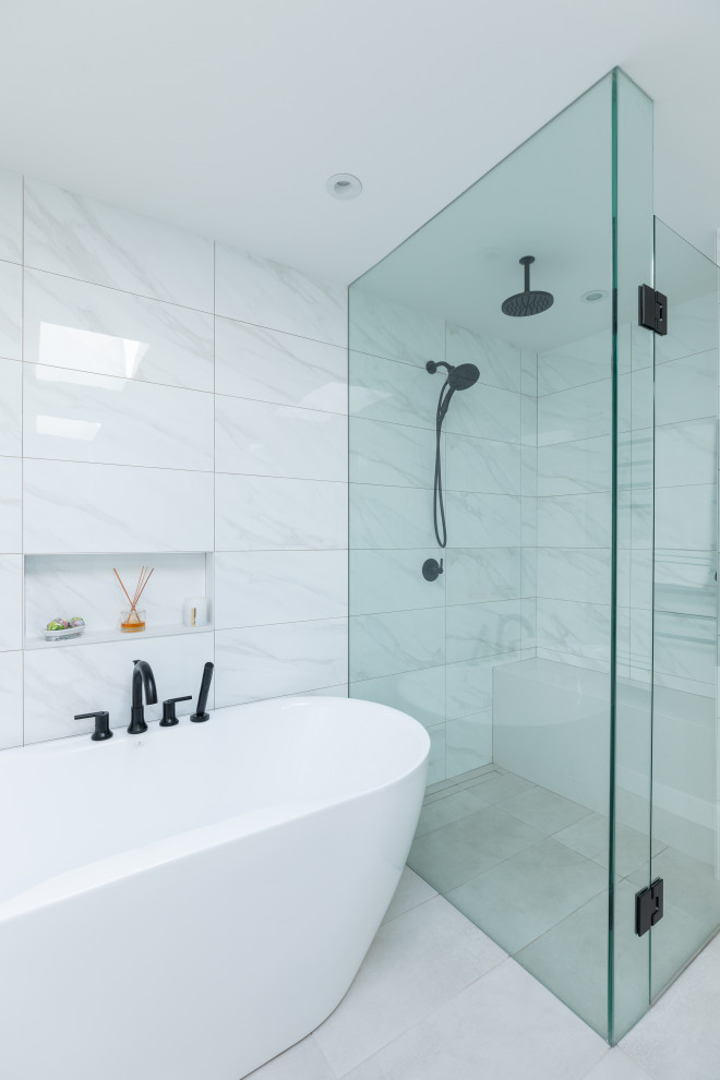 This is an example of a large contemporary ensuite bathroom in Vancouver with white floors, a hinged door and white worktops.