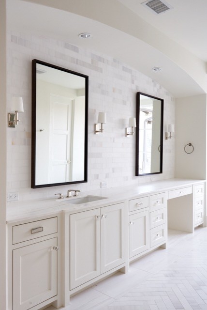 Inspiration for a large classic sauna bathroom in Dallas with a freestanding bath, white tiles, beige walls, limestone flooring, marble worktops, recessed-panel cabinets and white cabinets.