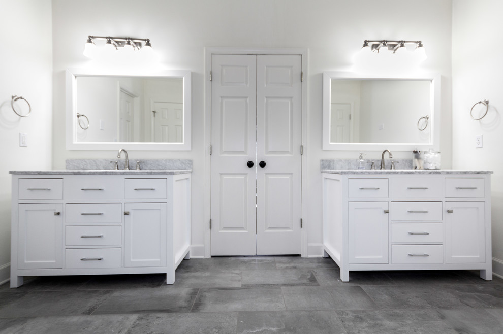 Example of a mid-sized transitional master white tile slate floor bathroom design in Atlanta with white walls, shaker cabinets, white cabinets and marble countertops