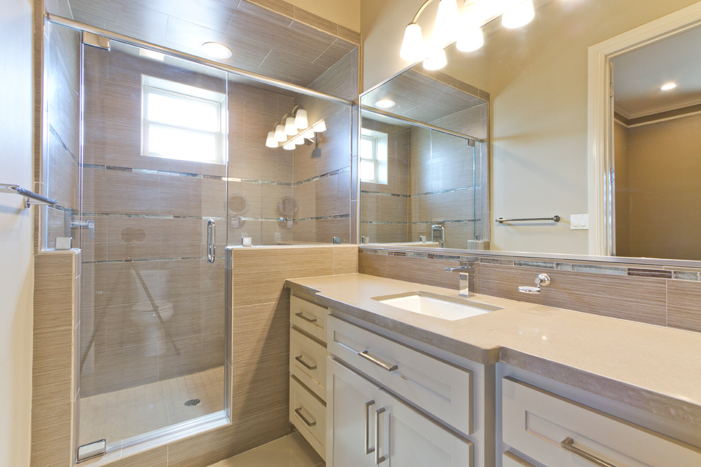 This is an example of a medium sized traditional ensuite bathroom in Austin with recessed-panel cabinets, white cabinets, a corner shower, beige walls, ceramic flooring, a built-in sink, laminate worktops, beige floors and a hinged door.