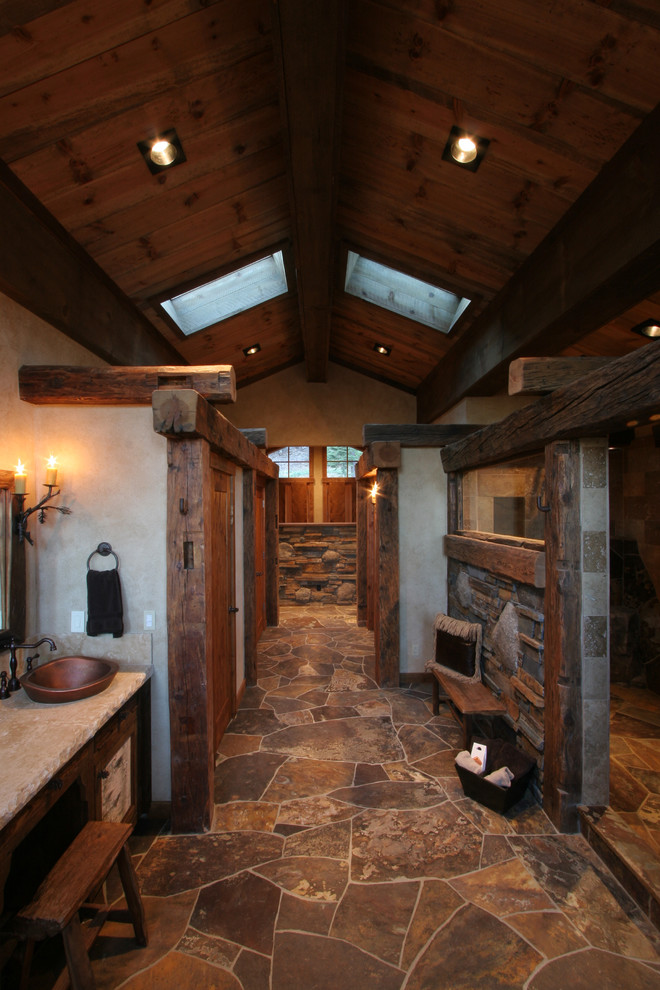 This is an example of a rustic bathroom in Sacramento with a vessel sink, a walk-in shower, brown tiles, beige walls, an open shower and slate tiles.