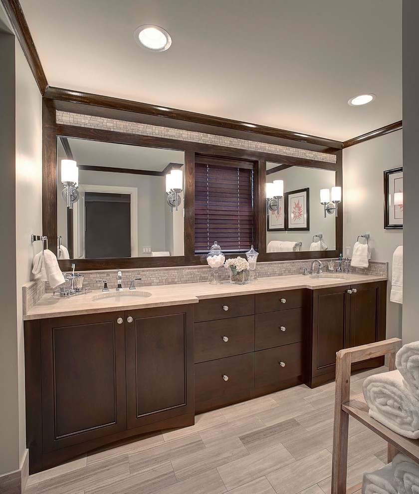 Design ideas for a medium sized contemporary ensuite bathroom in Detroit with beaded cabinets, beige cabinets, grey tiles, beige tiles, brown tiles, white tiles, limestone worktops, an alcove shower, ceramic tiles, grey walls, ceramic flooring and a submerged sink.