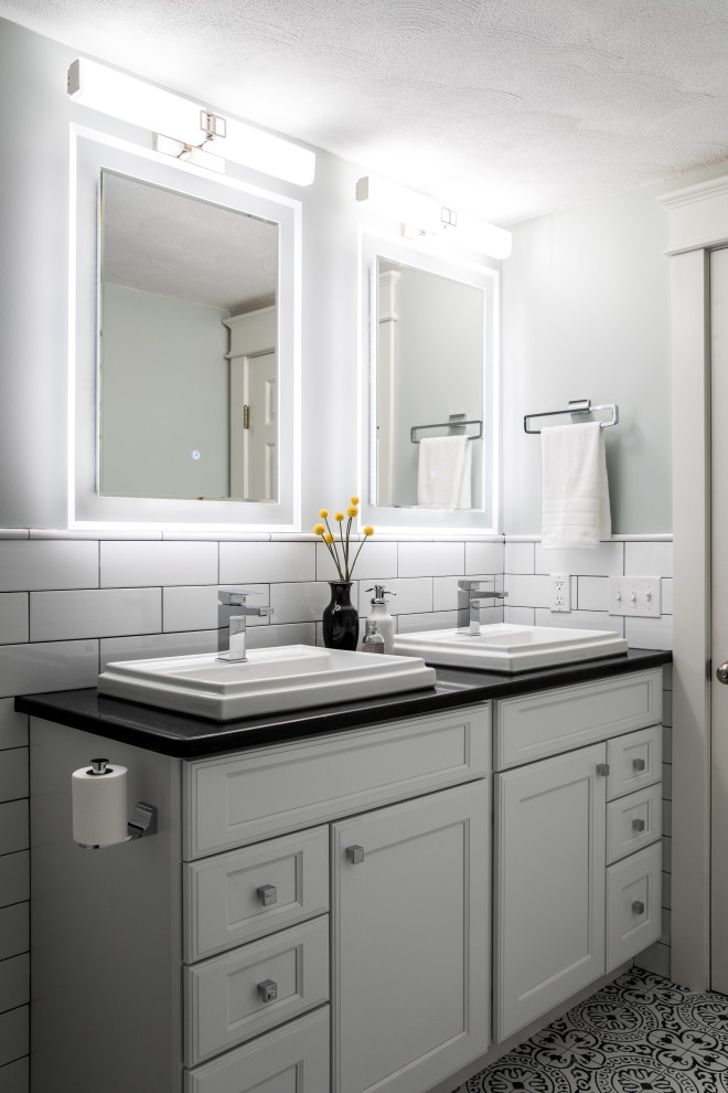 Classic shower room bathroom in Providence with recessed-panel cabinets, white cabinets, a built-in shower, a two-piece toilet, white tiles, ceramic tiles, green walls, cement flooring, a vessel sink, quartz worktops, an open shower and black worktops.