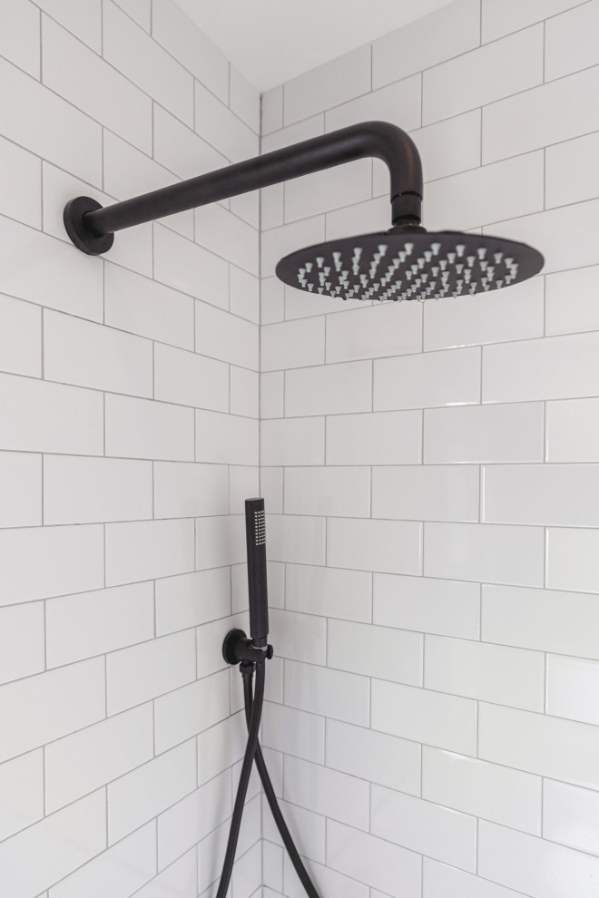 Design ideas for a small midcentury shower room bathroom in Seattle with beaded cabinets, light wood cabinets, an alcove bath, black walls, ceramic flooring, quartz worktops, black floors, white worktops, a single sink and a freestanding vanity unit.