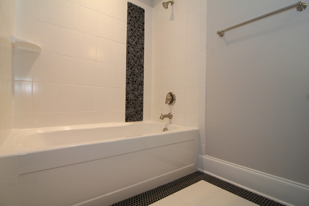 Photo of a large contemporary family bathroom in Raleigh with recessed-panel cabinets, dark wood cabinets, a corner bath, a corner shower, a one-piece toilet, white tiles, mosaic tiles, grey walls and ceramic flooring.