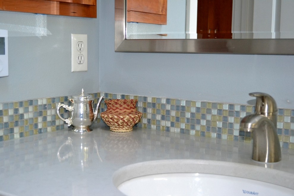 Bathroom - mid-sized transitional blue tile ceramic tile bathroom idea in Seattle with an undermount sink, shaker cabinets, medium tone wood cabinets, quartz countertops and gray walls