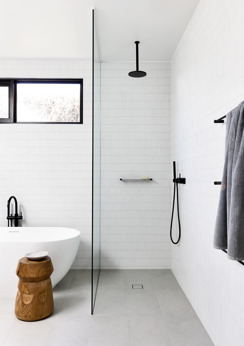 White Bathroom with Sleek Black Fixtures