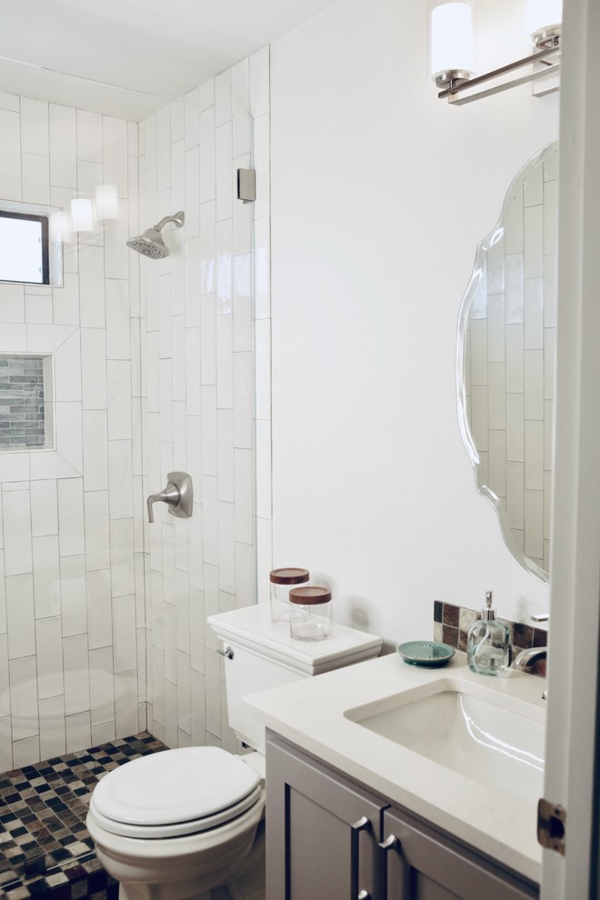 Design ideas for a small classic shower room bathroom in Austin with shaker cabinets, an alcove shower, a one-piece toilet, white tiles, ceramic tiles, white walls, slate flooring, a submerged sink, engineered stone worktops, an open shower, beige worktops, grey cabinets and multi-coloured floors.