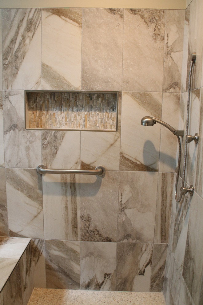 Inspiration for a huge timeless master multicolored tile and ceramic tile ceramic tile and beige floor walk-in shower remodel in Detroit with raised-panel cabinets, dark wood cabinets, a two-piece toilet, gray walls, an undermount sink, granite countertops, a hinged shower door and beige countertops