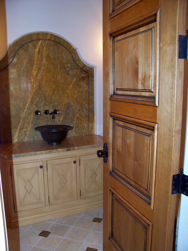 Example of a tuscan bathroom design in Detroit