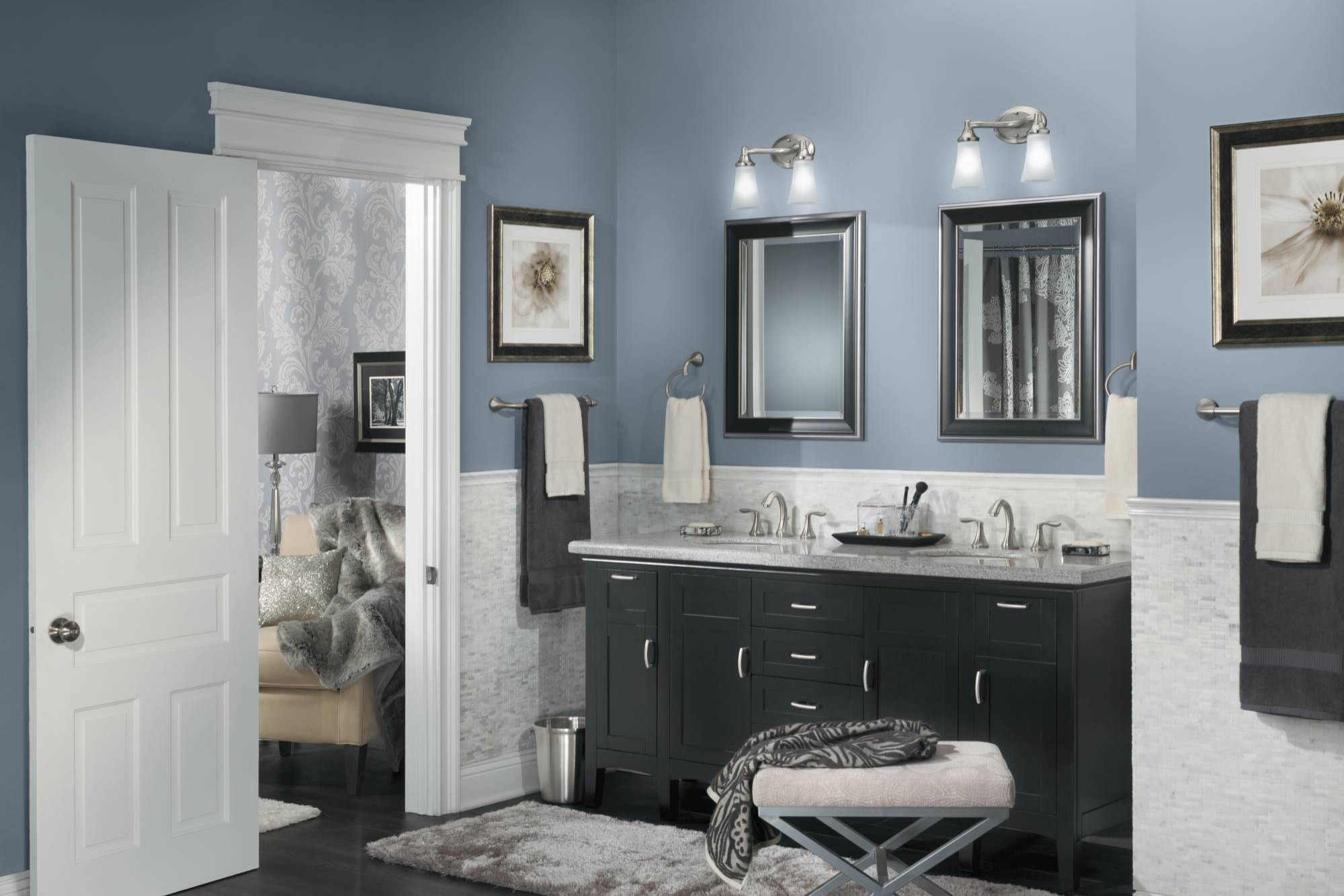 light blue bathroom with dark vanity