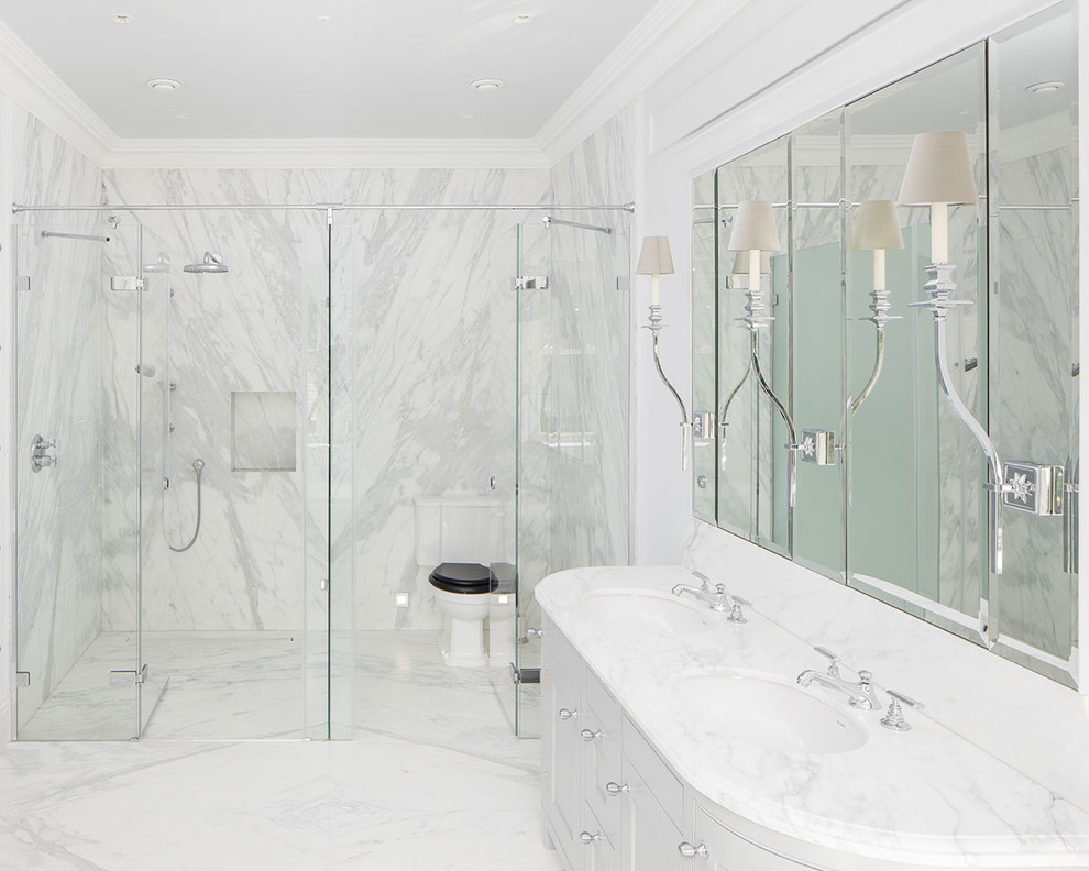 Photo of a large classic bathroom in Other with recessed-panel cabinets, white cabinets, marble tiles, multi-coloured walls, marble flooring, marble worktops and a hinged door.