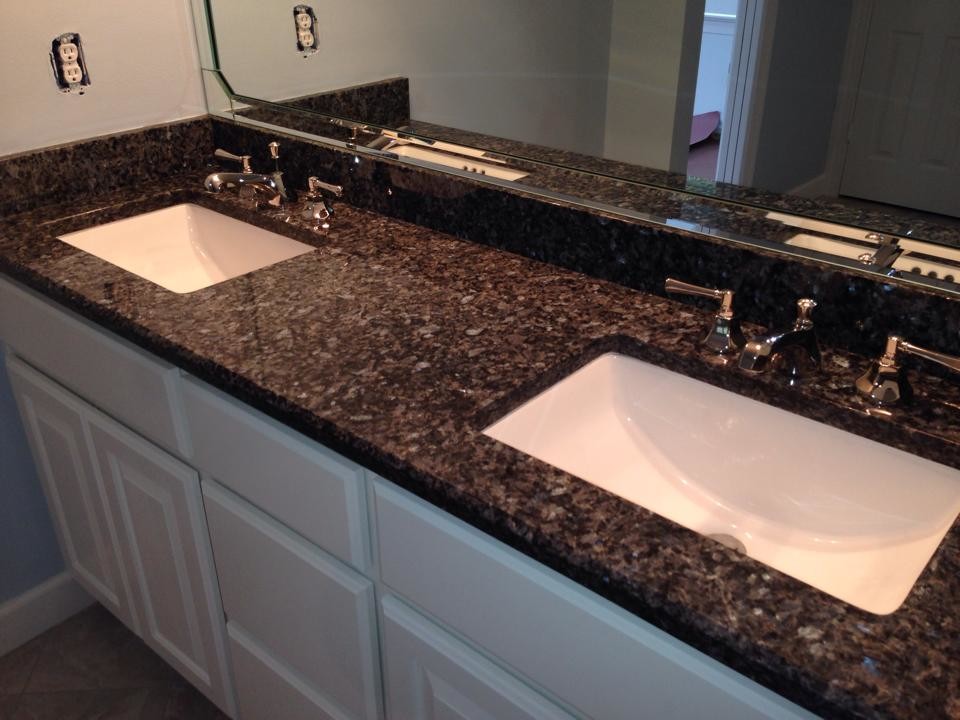 Blue Pearl Bathroom Vanity and Tub Surrounding Modern Bathroom