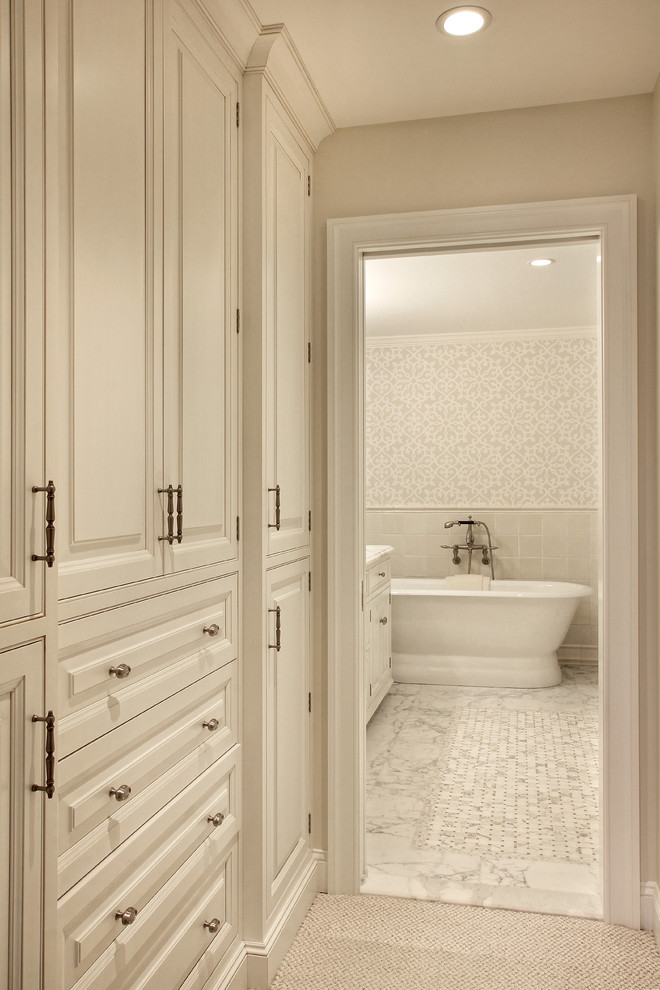 Bathroom - large traditional white tile and stone tile marble floor bathroom idea in Philadelphia with an undermount sink, beaded inset cabinets, white cabinets and marble countertops