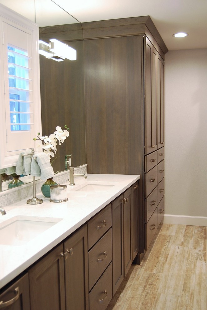 Photo of a small traditional bathroom in Denver with shaker cabinets.