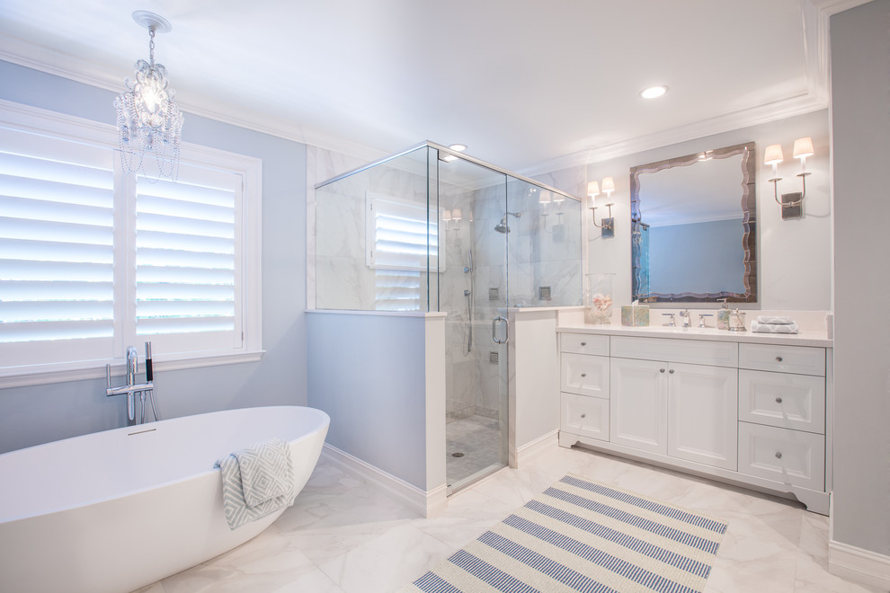 Example of a mid-sized beach style bathroom design in Other with white countertops