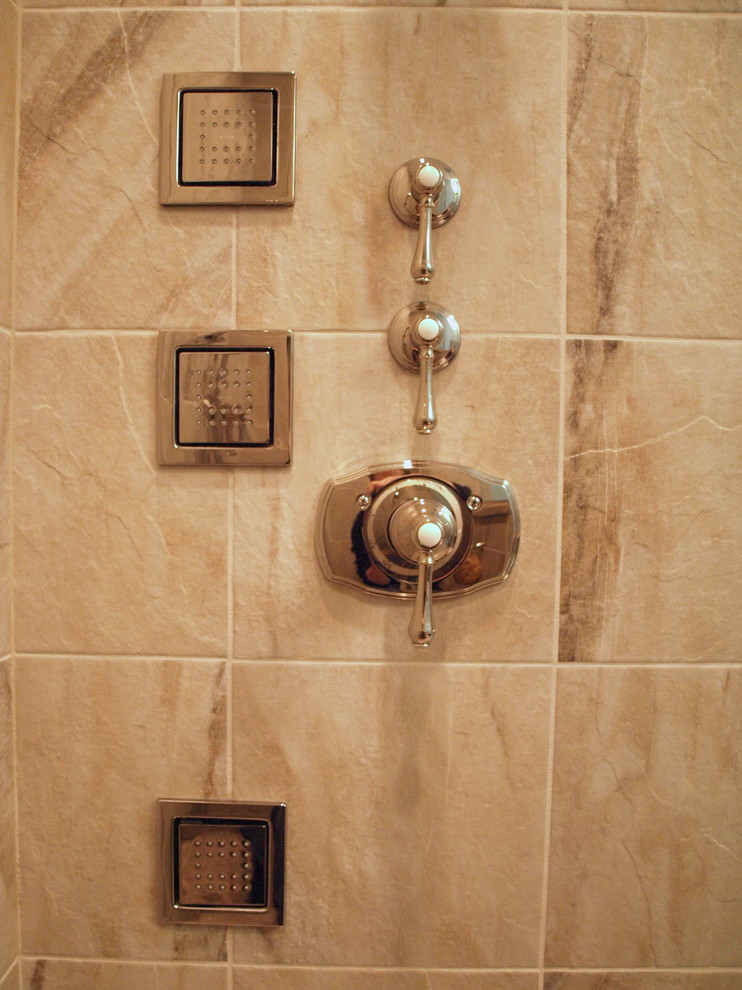 Example of a small classic master beige tile and ceramic tile ceramic tile and beige floor doorless shower design in Newark with flat-panel cabinets, dark wood cabinets, a one-piece toilet, blue walls, an undermount sink and granite countertops