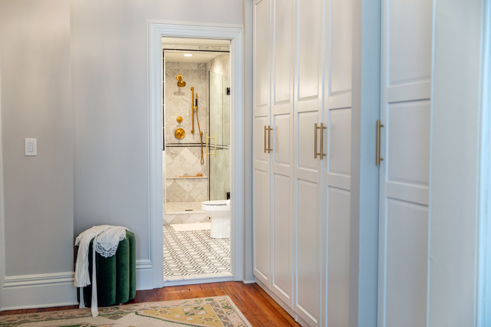 Bathroom - traditional master marble tile marble floor, double-sink and wainscoting bathroom idea in Baltimore with beaded inset cabinets, white cabinets, a hinged shower door, white countertops and a freestanding vanity