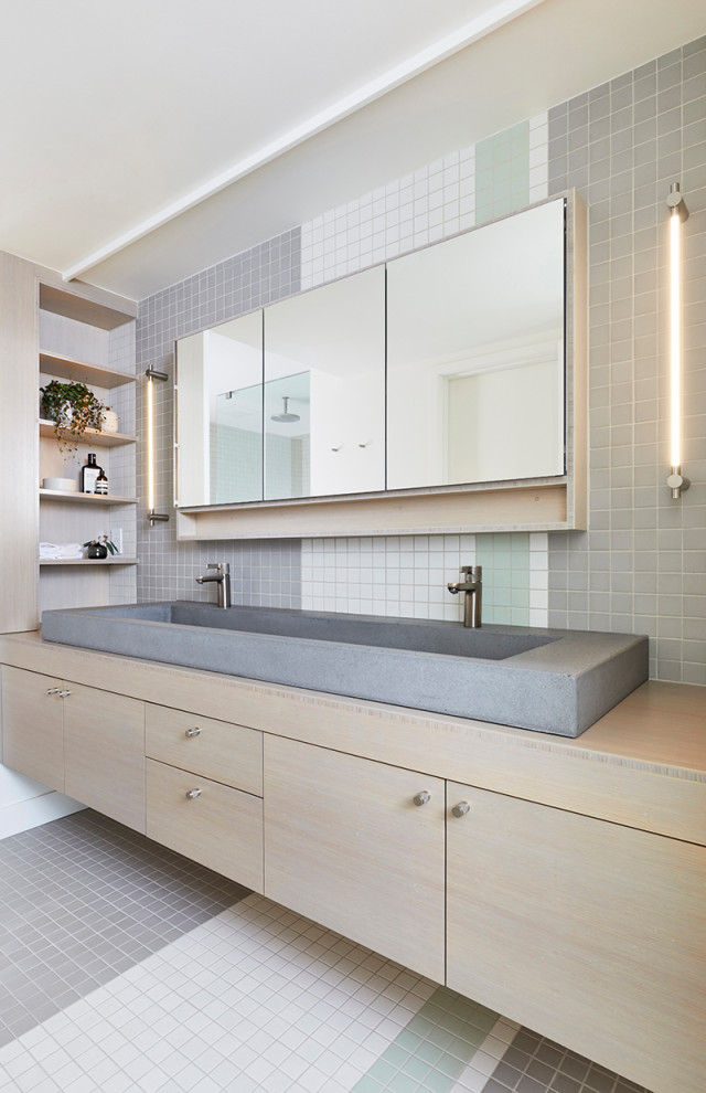 Bathroom - mid-sized contemporary master multicolored tile and mosaic tile mosaic tile floor and multicolored floor bathroom idea in Portland with flat-panel cabinets, light wood cabinets, a trough sink, wood countertops and beige countertops