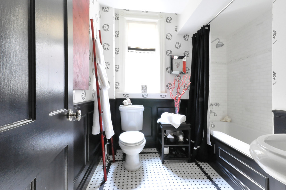 Small traditional shower room bathroom in Toronto with a pedestal sink, a built-in bath, a two-piece toilet, multi-coloured tiles, black walls and marble flooring.